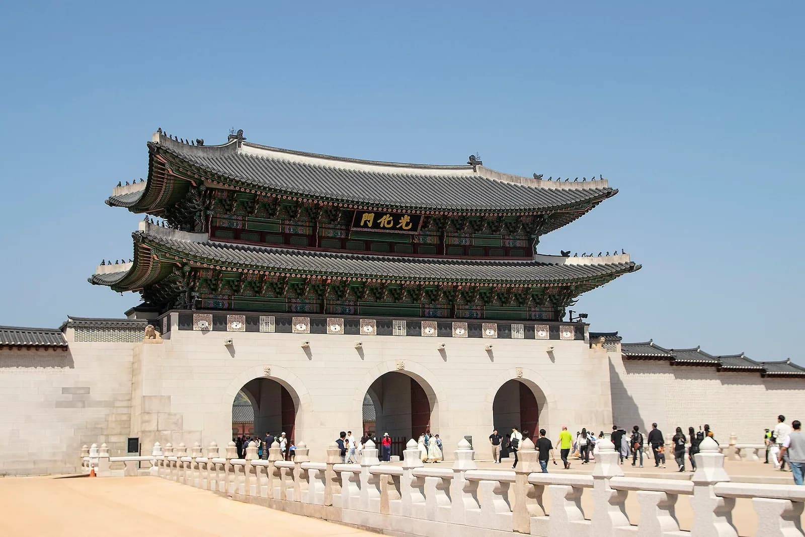 Gwanghwamun gate with its two-tier roof and restored stone woldae platform in front
